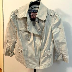 Juicy Couture jacket. Sleeve just covers the elbow.